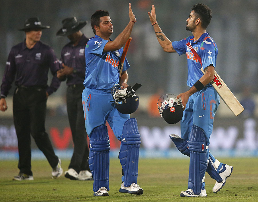 Suresh Raina and Virat Kohli celebrate India's win