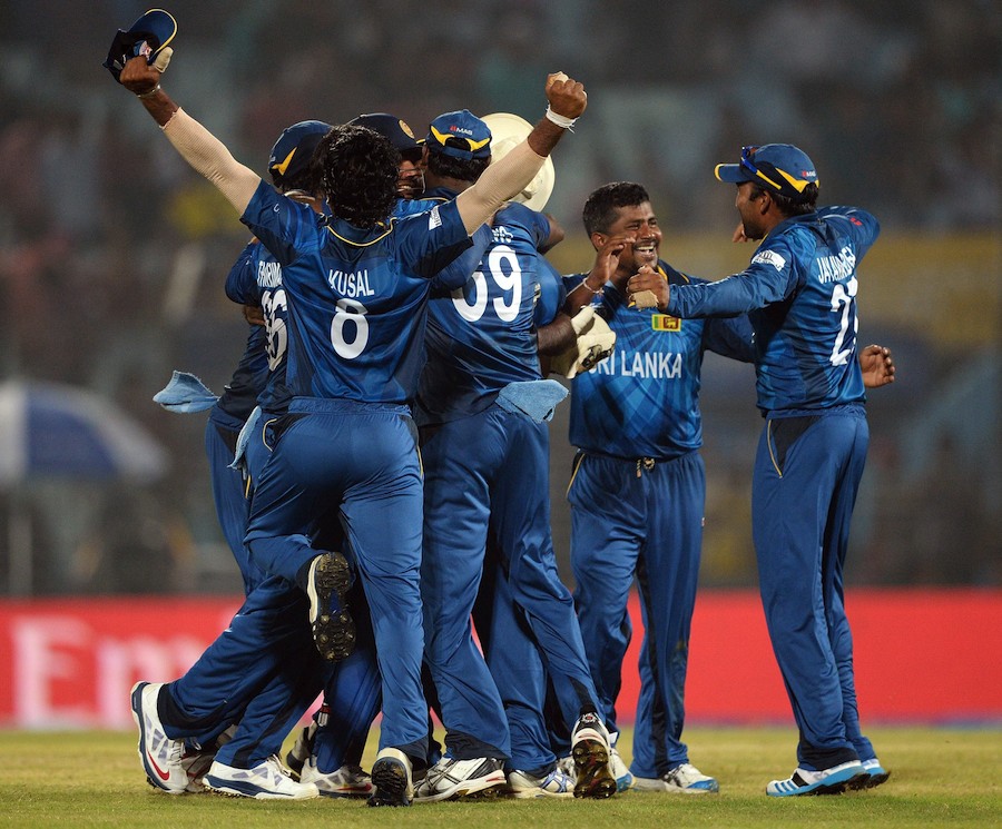 The Sri Lankans gather to celebrate a stunning win