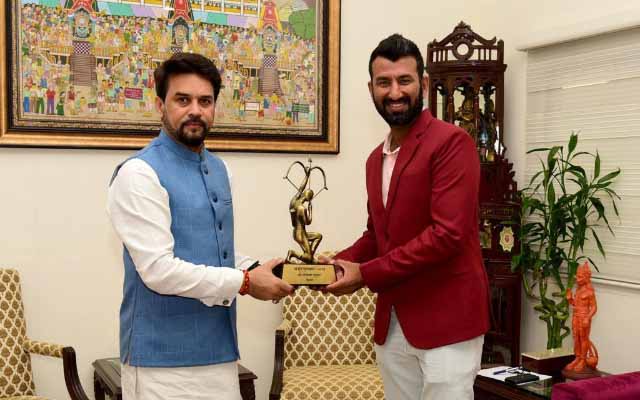 Anurag Thakur and Cheteshwar Pujara