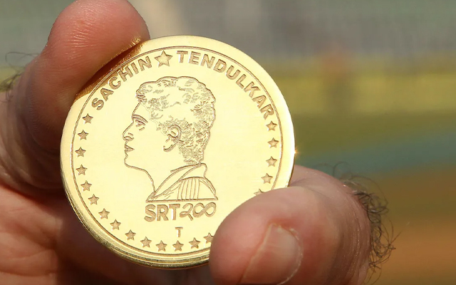 Sachin Tendulkar  Special gold coin with Sachin's face used during the toss