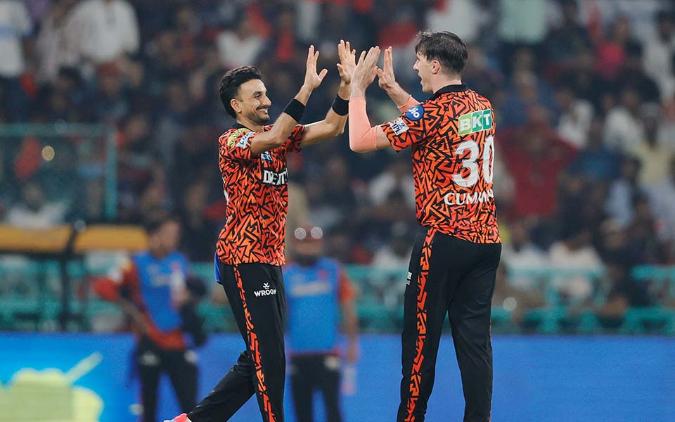 Harshal Patel and Pat Cummins
