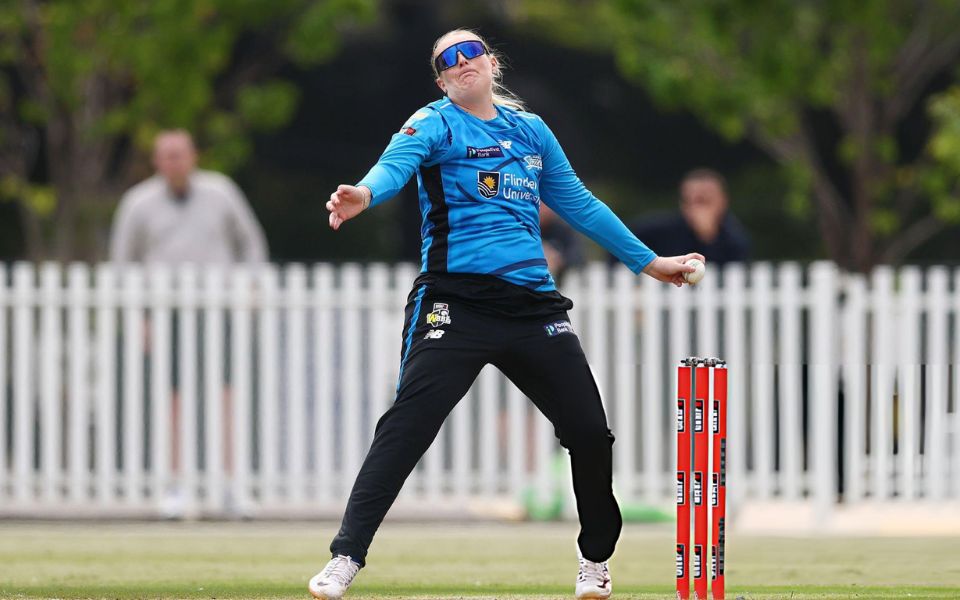 Sophie Ecclestone of the Strikers bowls during the WBBL match
