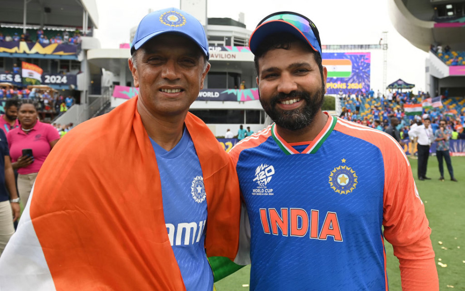 Rahul Dravid [L] and Rohit Sharma [R]