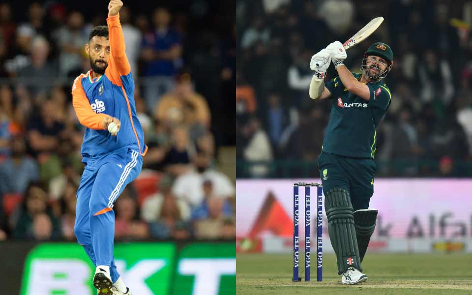 Varun Chakaravarthy and Travis Head