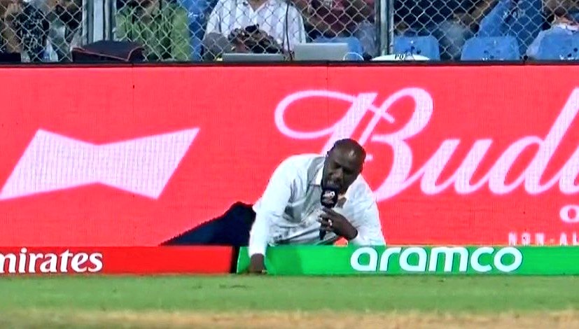T20 World Cup 2026: Ian Bishop lays by boundary ropes to report dew at Wankhede during WI vs ENG match