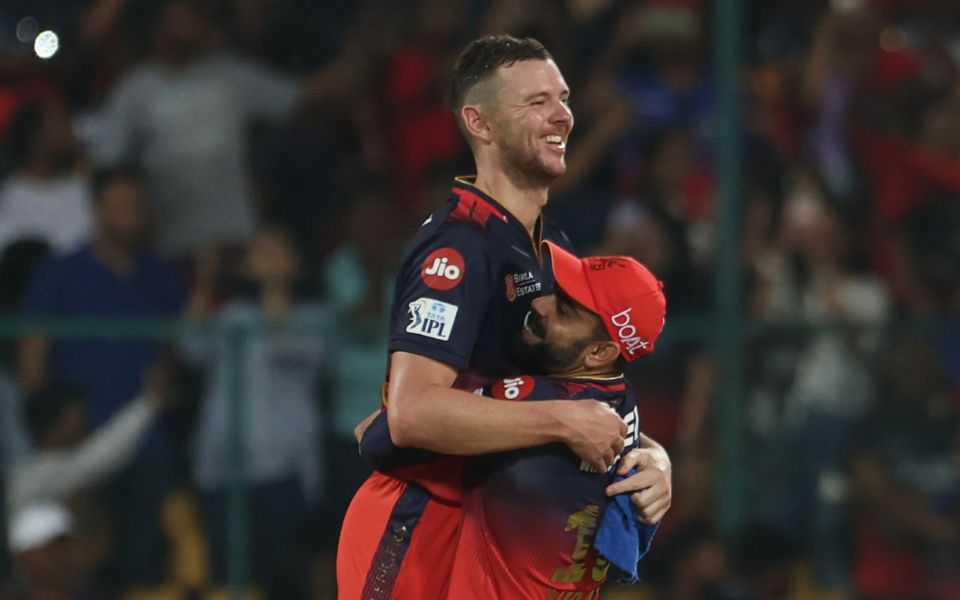 Josh Hazelwood & Virat Kohli