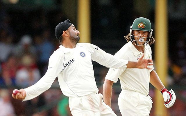 Andrew Symonds of Australia watches Harbhajan Singh