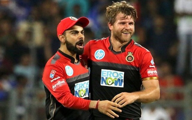 Corey Anderson and Virat Kohli