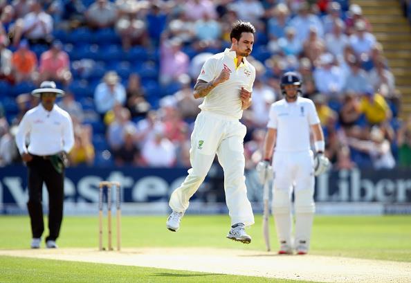 Mitchell Johnson Celebrates After Taking Wicket of Ian Bell