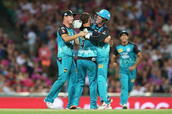 SYDNEY, AUSTRALIA - JANUARY 10: Mitchell Swepson of the Heat celebrates with team mates after claiming the wicket of Nick Larkin of the Sixers during the Big Bash League match between the Sydney Sixers and the Brisbane Heat at Sydney Cricket Ground on January 10, 2016 in Sydney, Australia. (Photo by Brendon Thorne - CA/Cricket Australia/Getty Images)