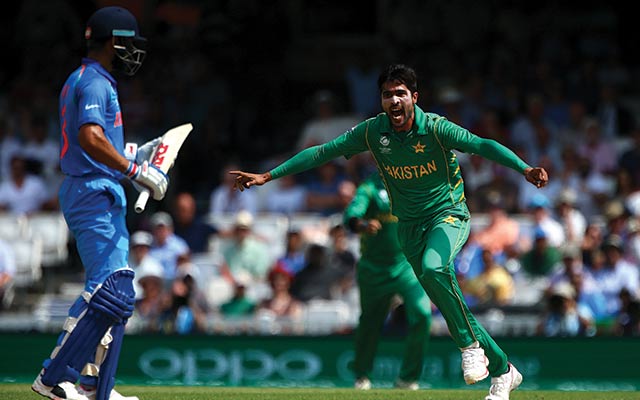 Mohammad Amir of Pakistan celebrates after claiming the wicket of India's Virat Kohli