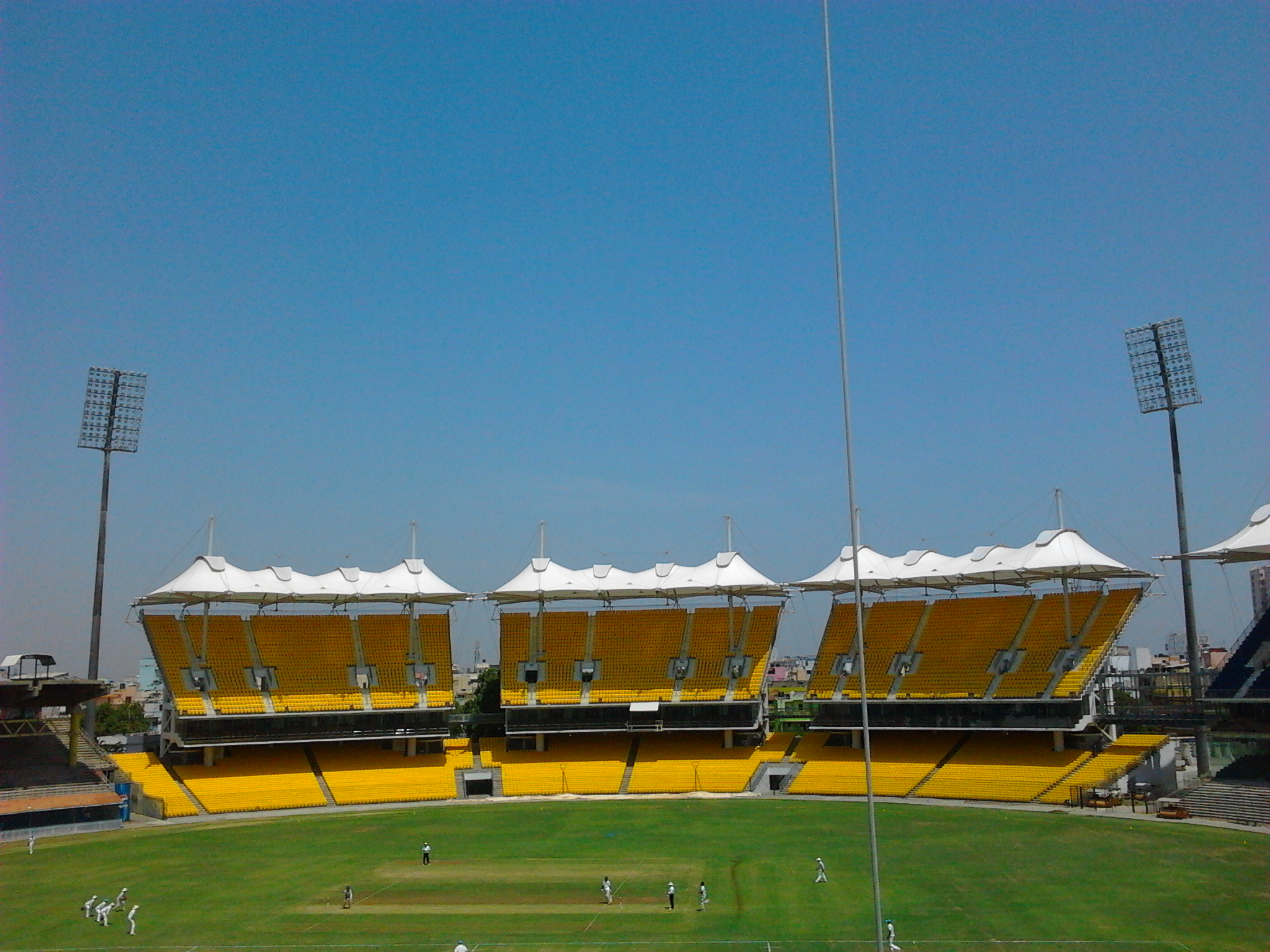 https://upload.wikimedia.org/wikipedia/commons/9/9f/New_stands_with_fabric_tensile_rooves_at_the_M._A._Chidambaram_Stadium.jpg