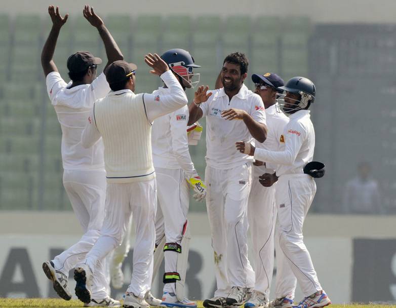 Sri Lanka team celebrates as they clinch a win over bangladesh of an innings and 248 runs. (Photo Source: AFP)