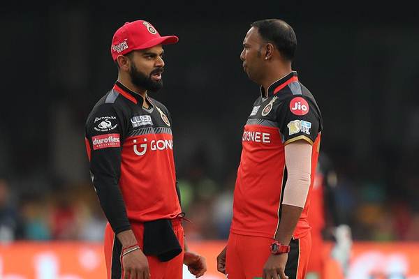 Virat Kohli and Samuel Badree