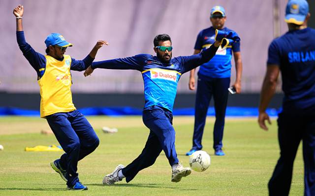 Kandy, Sri Lanka. 30th November 2022. Sri Lanka's Dhananjaya de Silva  reacts after bowling during the 3rd ODI cricket match between Sri Lanka vs  Afghanistan at the Pallekele International Cricket Stadium in