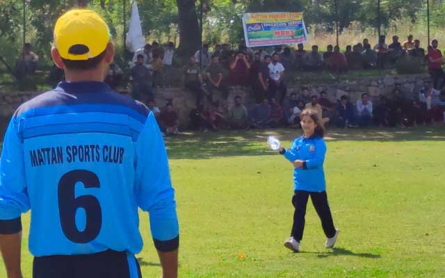Daughter carrying drinks for her father