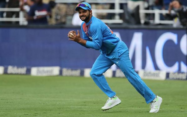 Suresh Raina of India takes the catch to dismiss Heinrich Klassen of South Africa