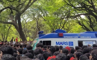 Ambulance carries unconscious patient at M. Chinnaswamy Stadium, Bengaluru - RCB Victory Parade event