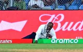 Ian Bishop lays by boundary ropes to report dew at Wankhede during WI vs ENG match